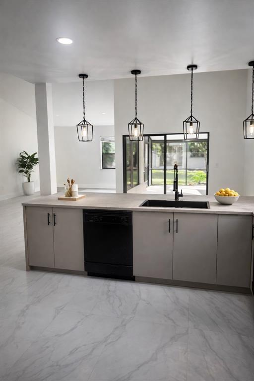 a kitchen with a sink and cabinets
