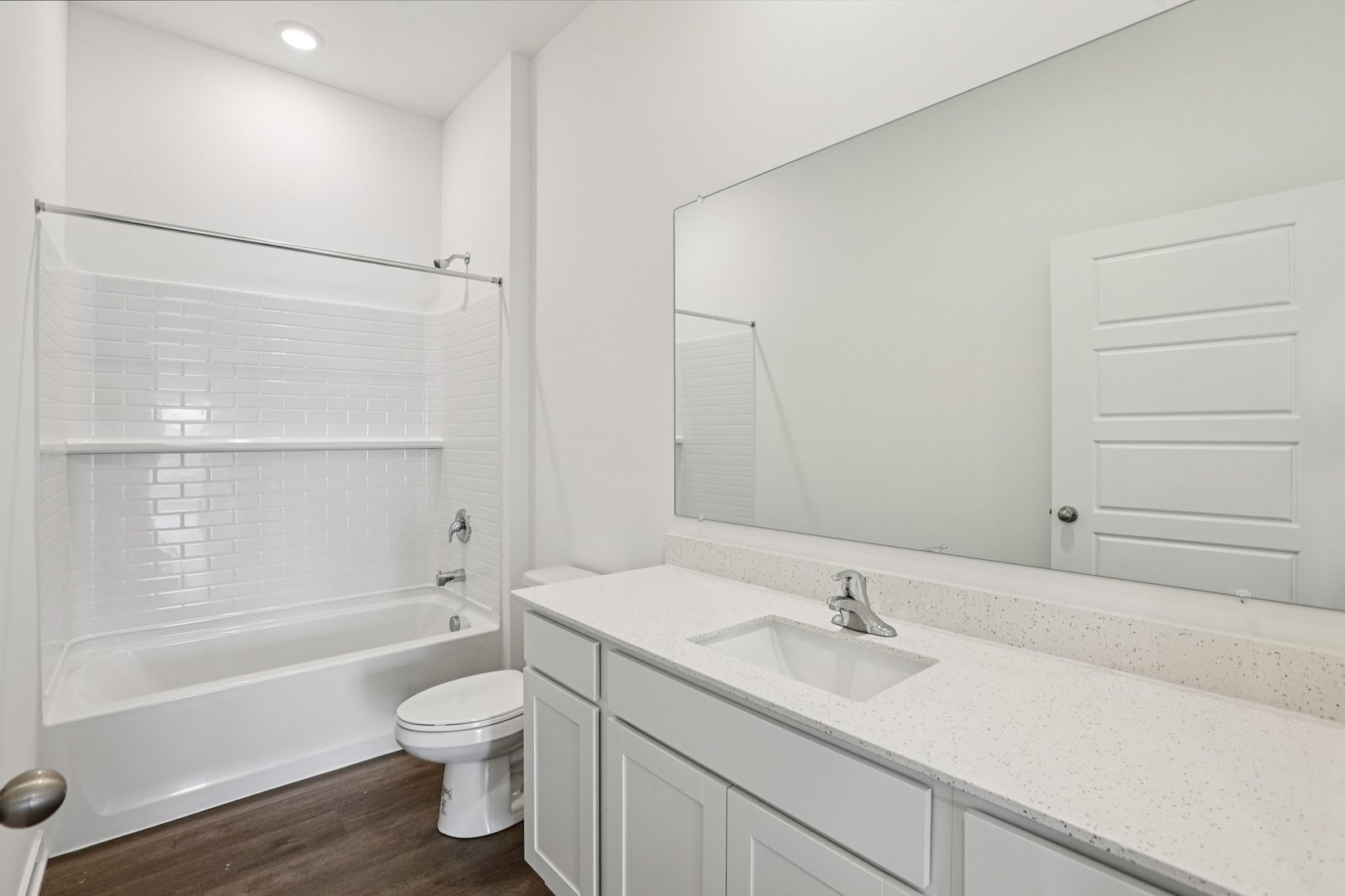 6481 Juniper Drive Wonder Lake, IL 60097 - Photo 23 of 59 a bathroom with a sink a toilet and a bathtub