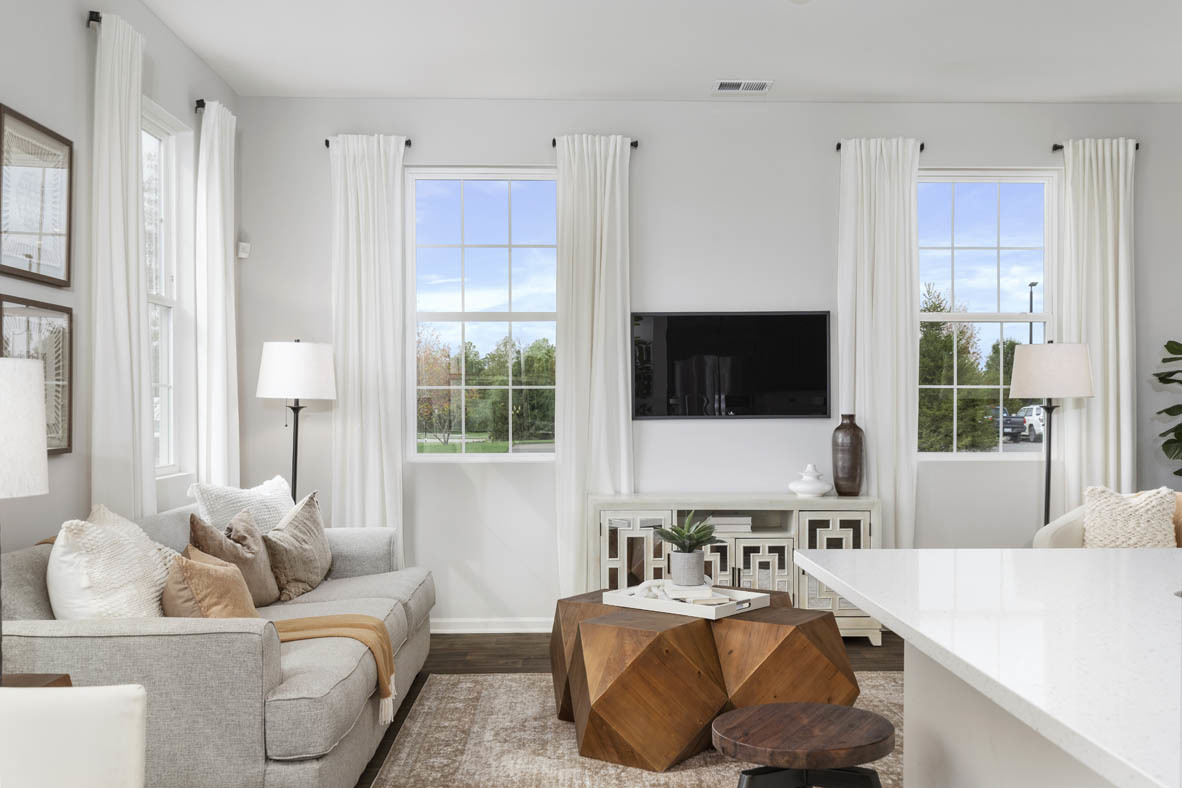 6481 Juniper Drive Wonder Lake, IL 60097 - Photo 34 of 59 a living room with furniture and a flat screen tv