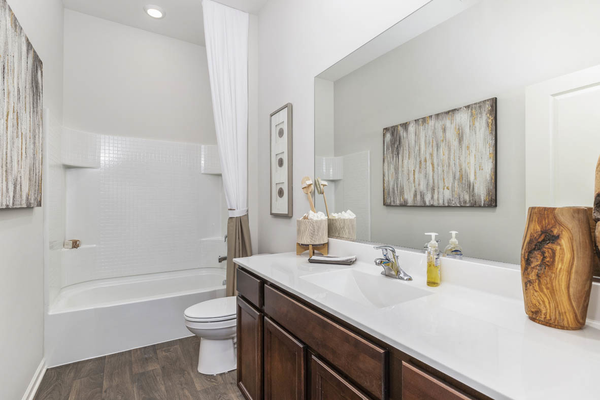 6481 Juniper Drive Wonder Lake, IL 60097 - Photo 41 of 59 a bathroom with a granite countertop sink a toilet and shower