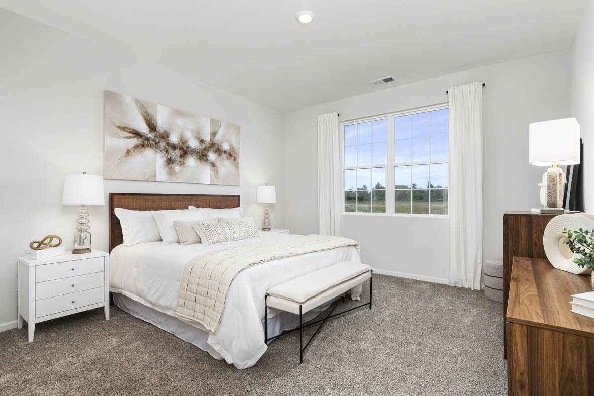 6481 Juniper Drive Wonder Lake, IL 60097 - Photo 42 of 59 a bedroom with a bed and a window