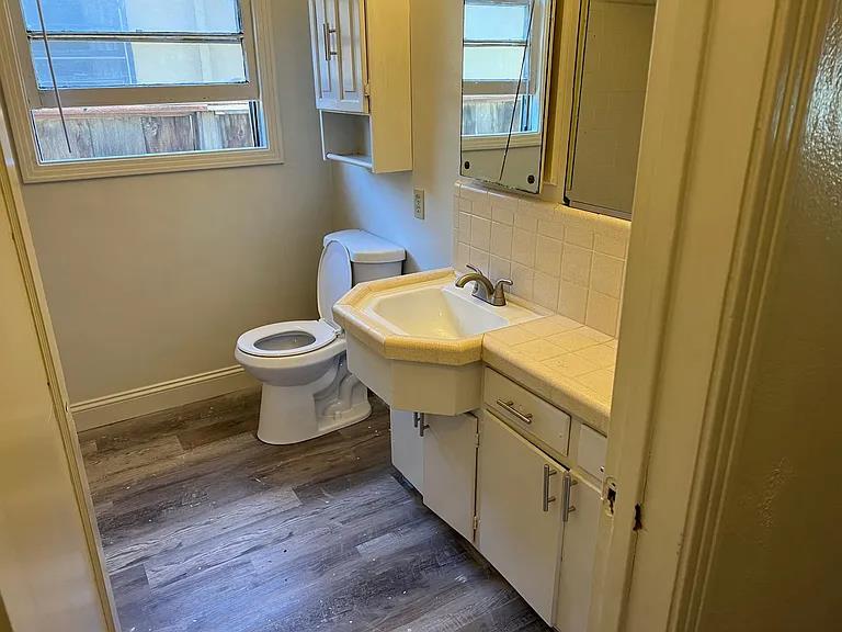 301 East Morris Avenue Modesto, CA 95354 - Photo 26 of 29 a bathroom with a sink and a toilet