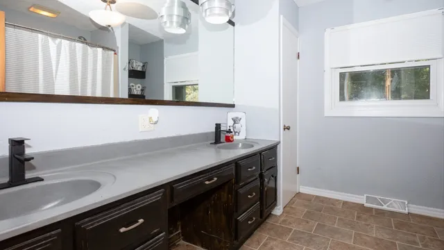 a kitchen with a sink and a cabinets