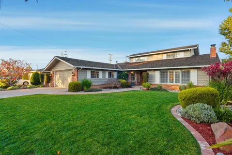 a view of house with outdoor space