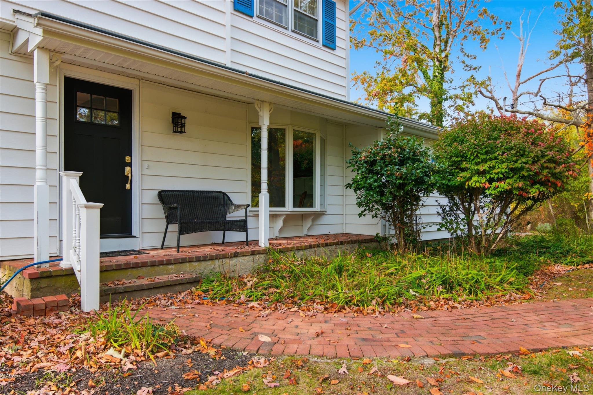 14 Flax Pond Woods Road Setauket, NY 11733 - Photo 2 of 41 a view of a house with a small yard