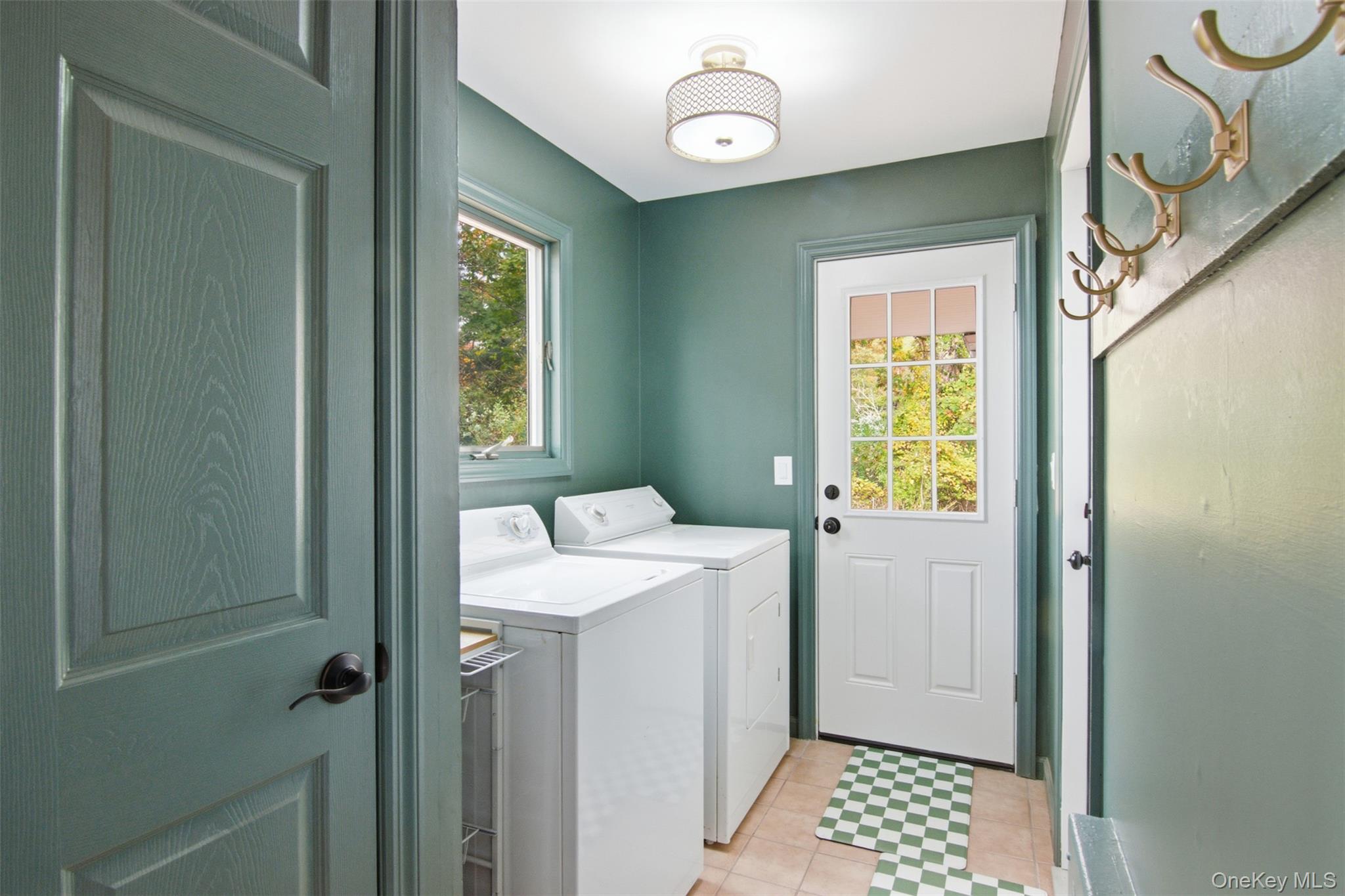 14 Flax Pond Woods Road Setauket, NY 11733 - Photo 23 of 41 a bathroom with a sink a mirror and a shower