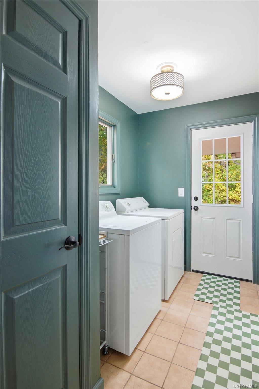 14 Flax Pond Woods Road Setauket, NY 11733 - Photo 24 of 41 a bathroom with a sink a toilet and a window