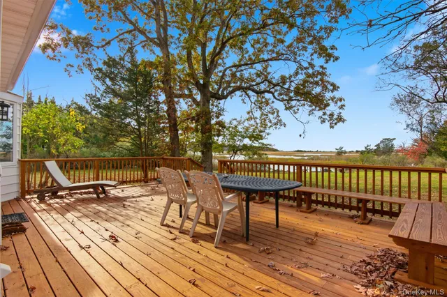 a view of a chairs on a deck