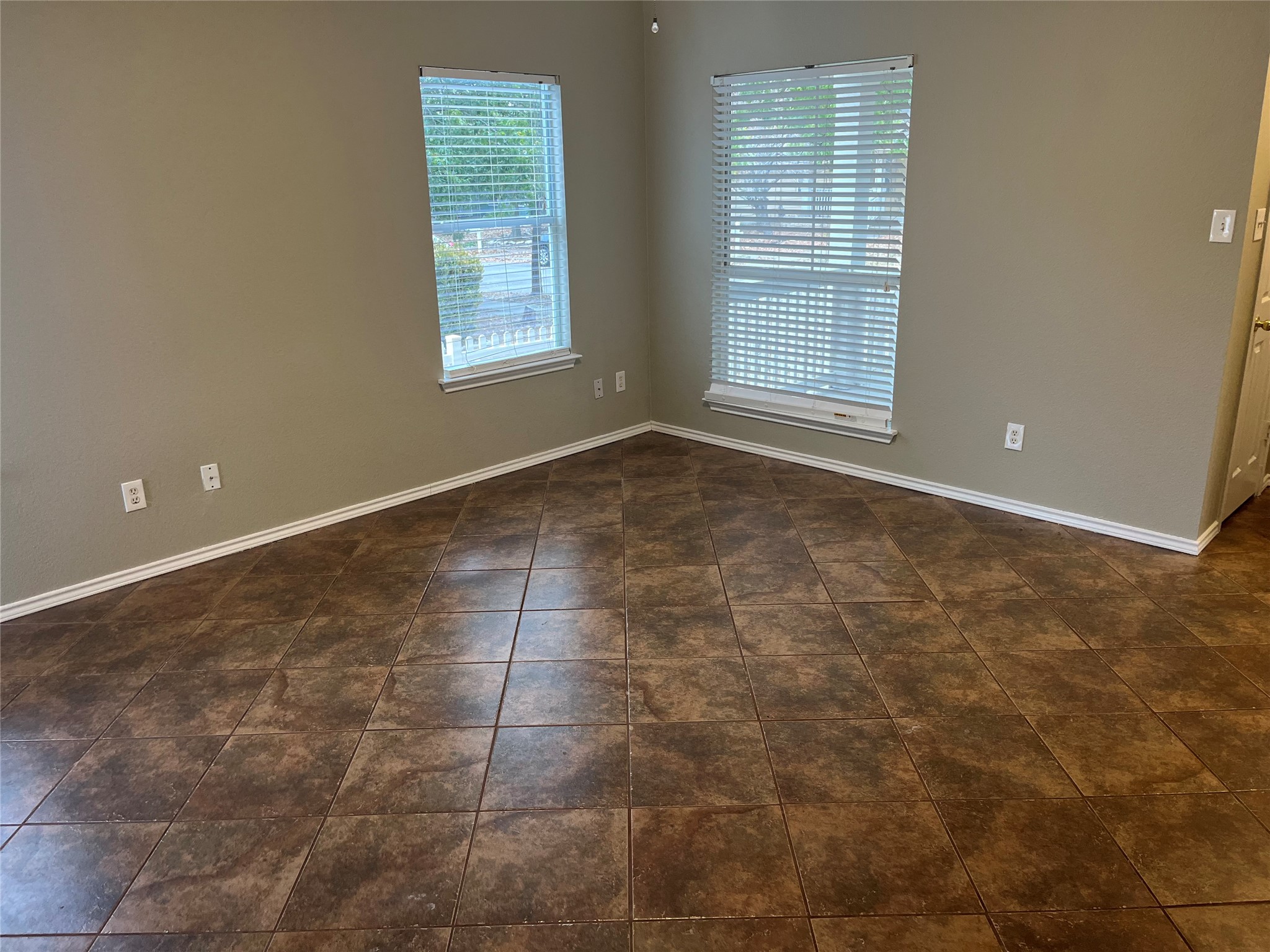 694 Hogan Kyle, TX 78640 - Photo 16 of 20 Empty room featuring plenty of natural light