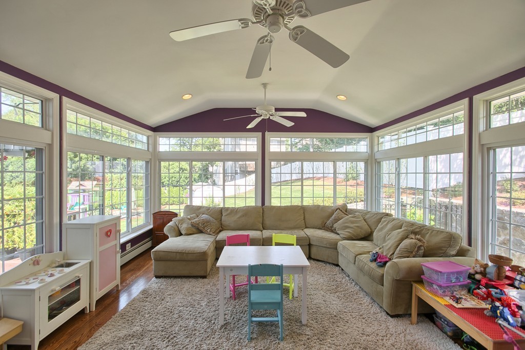 29 Spring Street Wakefield, MA 01880 - Photo 12 of 30 a living room with furniture and windows