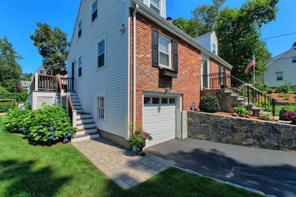 29 Spring Street Wakefield, MA 01880 - Photo 2 of 30 a front view of a house with a yard