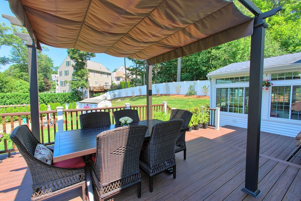29 Spring Street Wakefield, MA 01880 - Photo 23 of 30 a view of a patio with a table chairs and a table