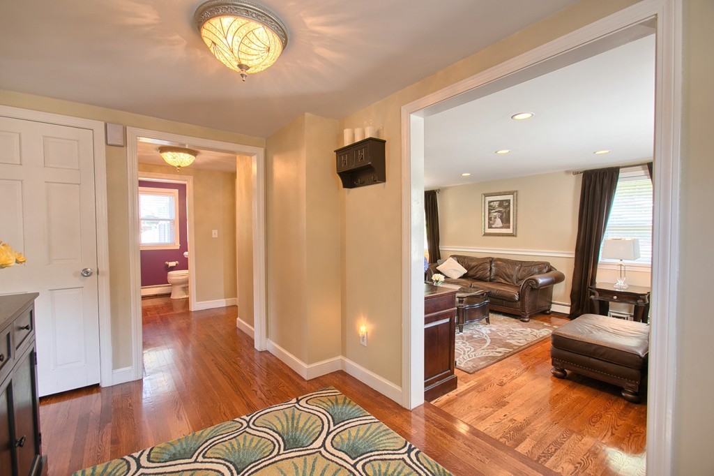 29 Spring Street Wakefield, MA 01880 - Photo 7 of 30 a view of a livingroom with furniture and hardwood floor