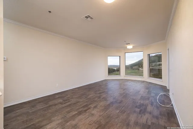 a view of kitchen with wooden floor