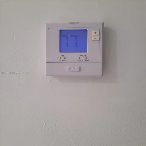 an empty room with mirror