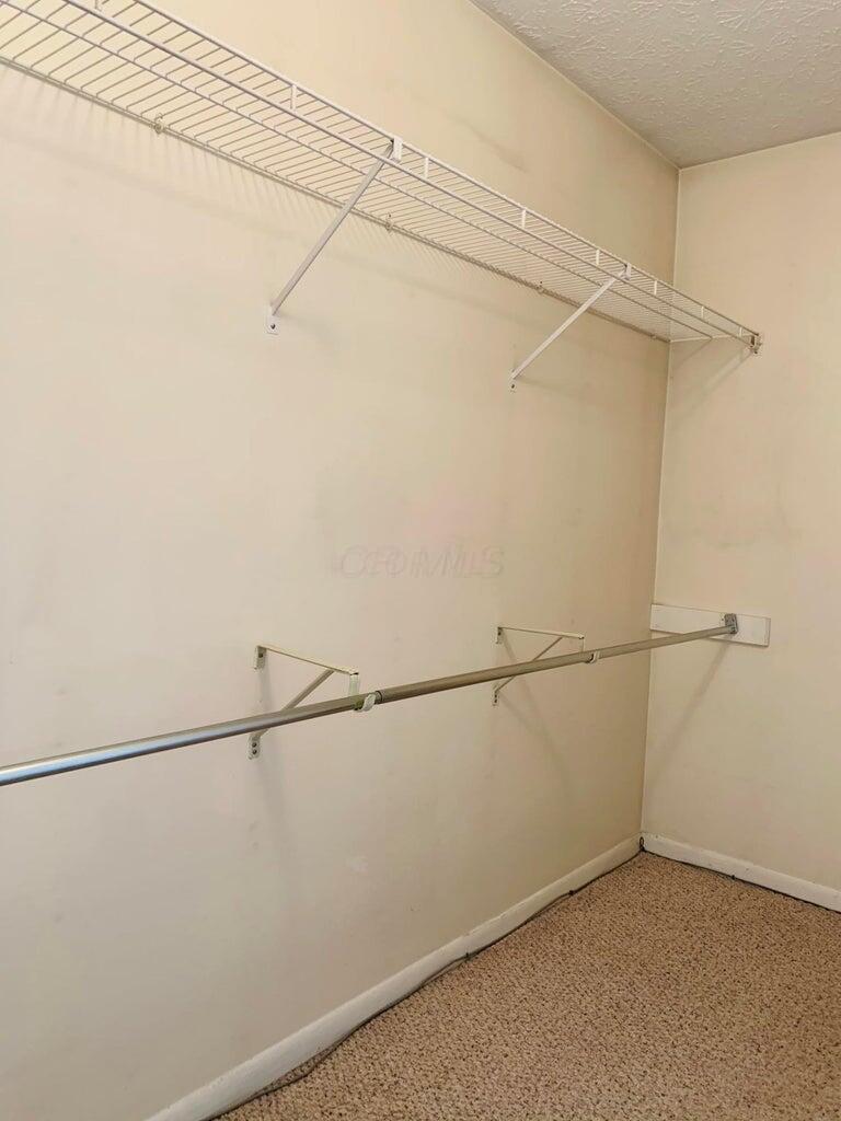 2188 Hedgerow Road, Unit 2188G Columbus, OH 43220 - Photo 10 of 26 Master walk-in closet 1