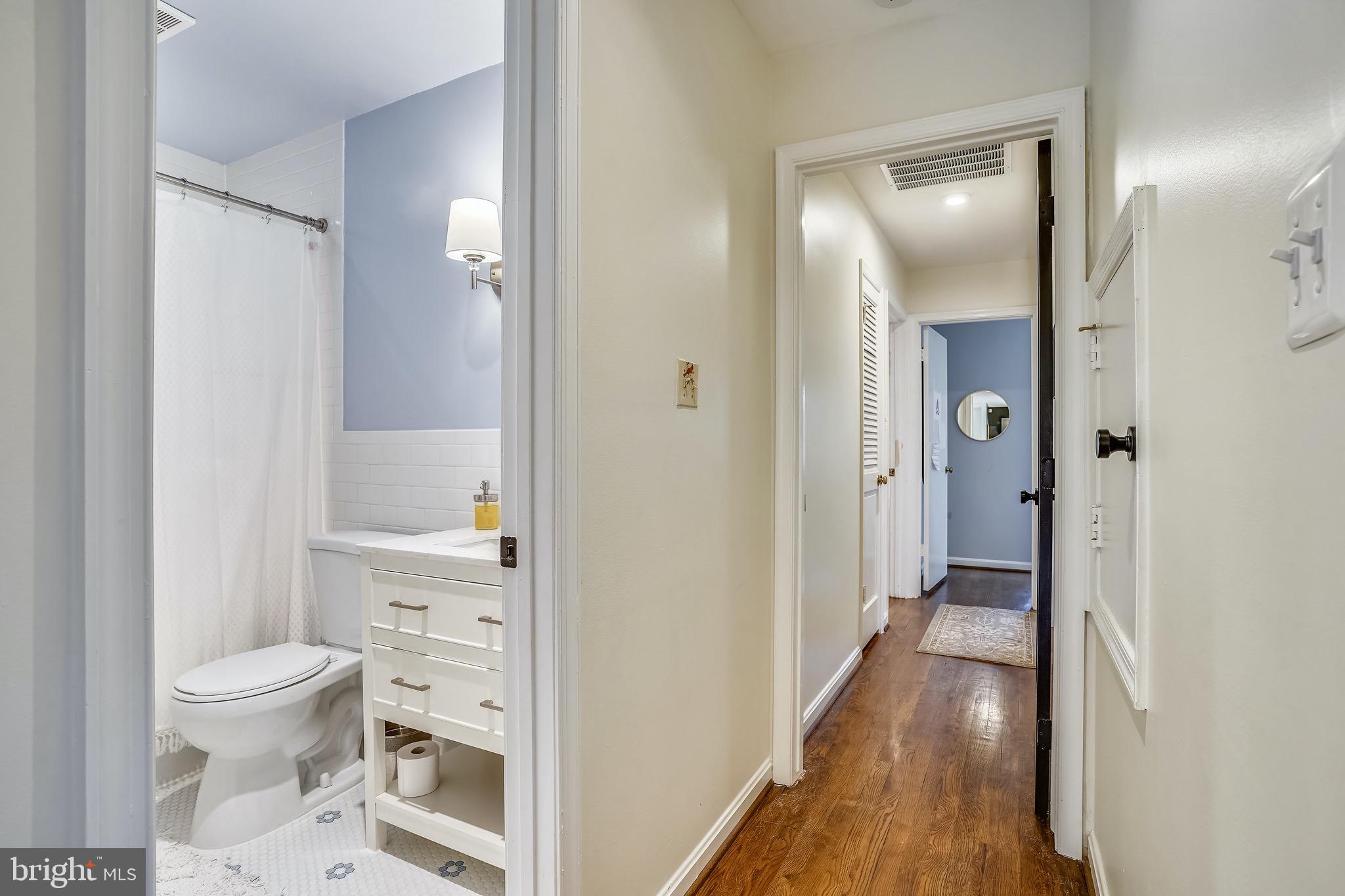 4106 North RoundHill Road Arlington, VA 22207 - Photo 29 of 55 Full bathroom #2- main level and hallway to rooms