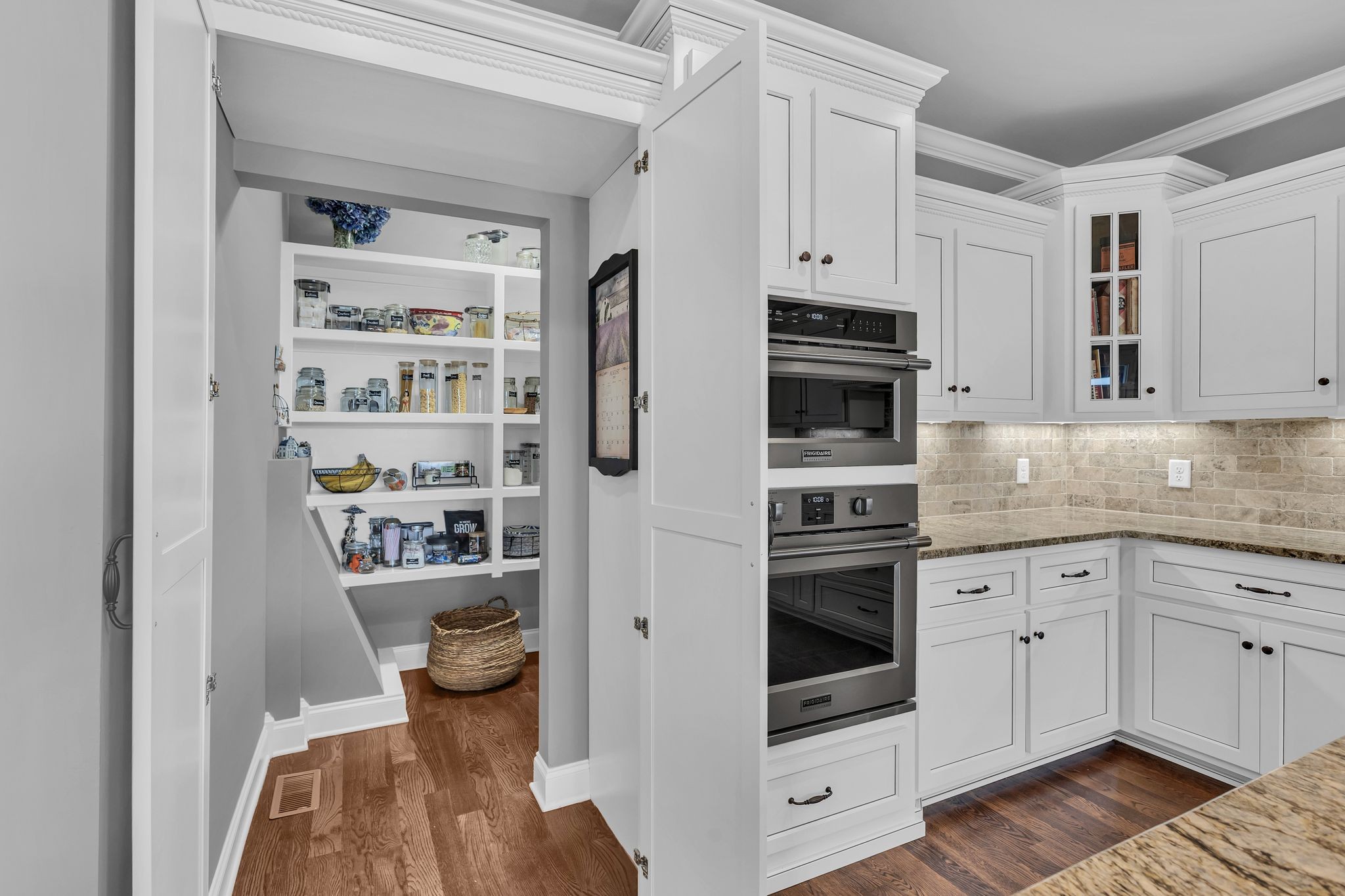 1007 Abbey Rd Way Spring Hill, TN 37174 - Photo 19 of 54 a kitchen with stainless steel appliances a stove and cabinets