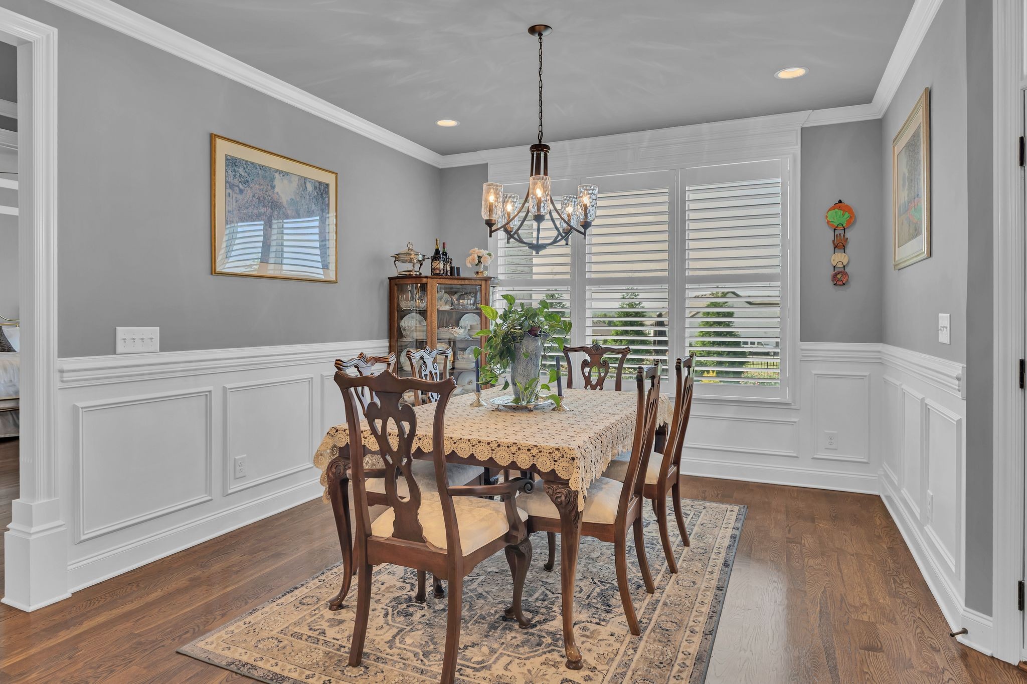 1007 Abbey Rd Way Spring Hill, TN 37174 - Photo 21 of 54 a view of a dining room with furniture window and wooden floor