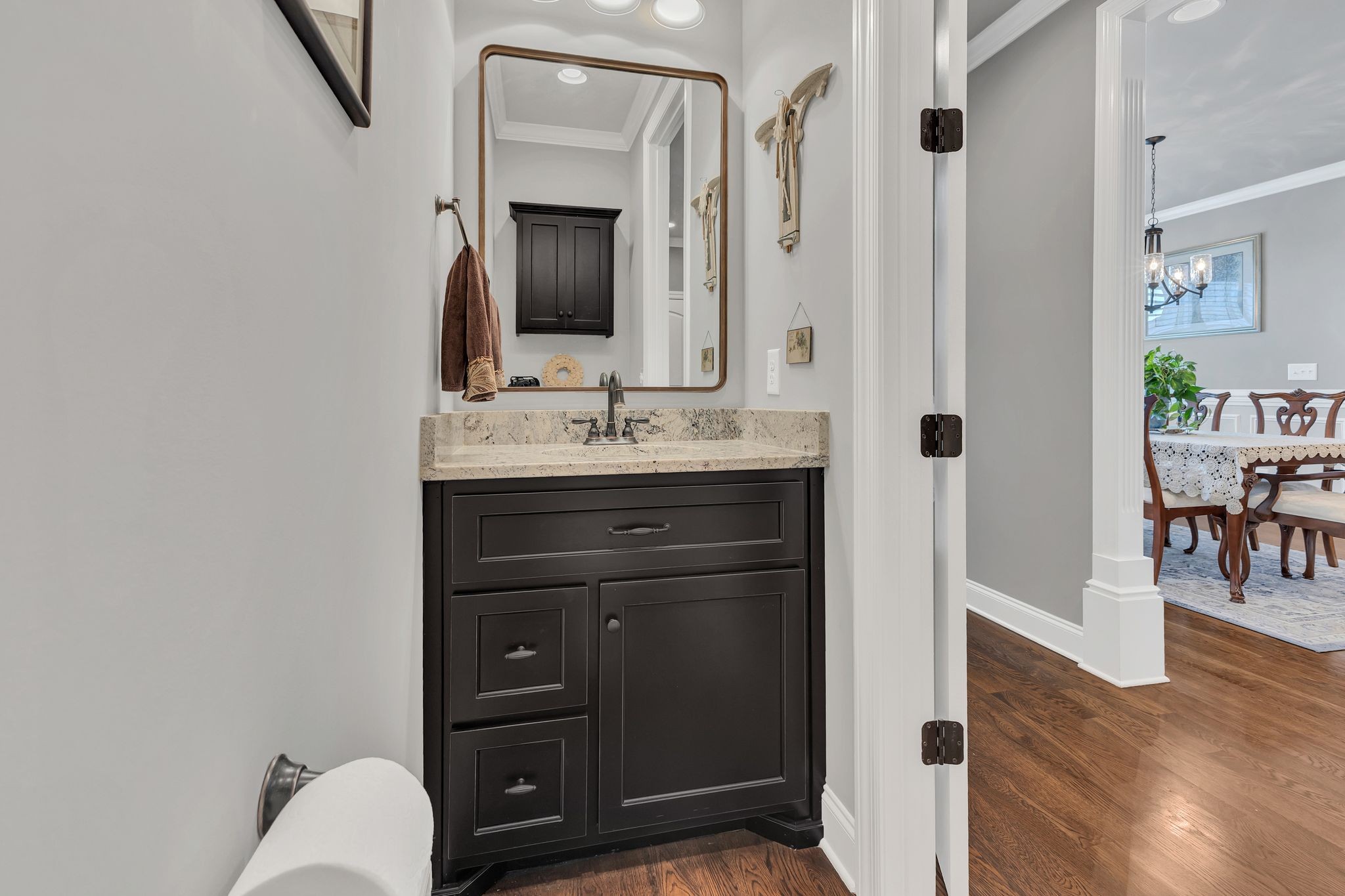 1007 Abbey Rd Way Spring Hill, TN 37174 - Photo 22 of 54 a bathroom with a sink vanity and a mirror