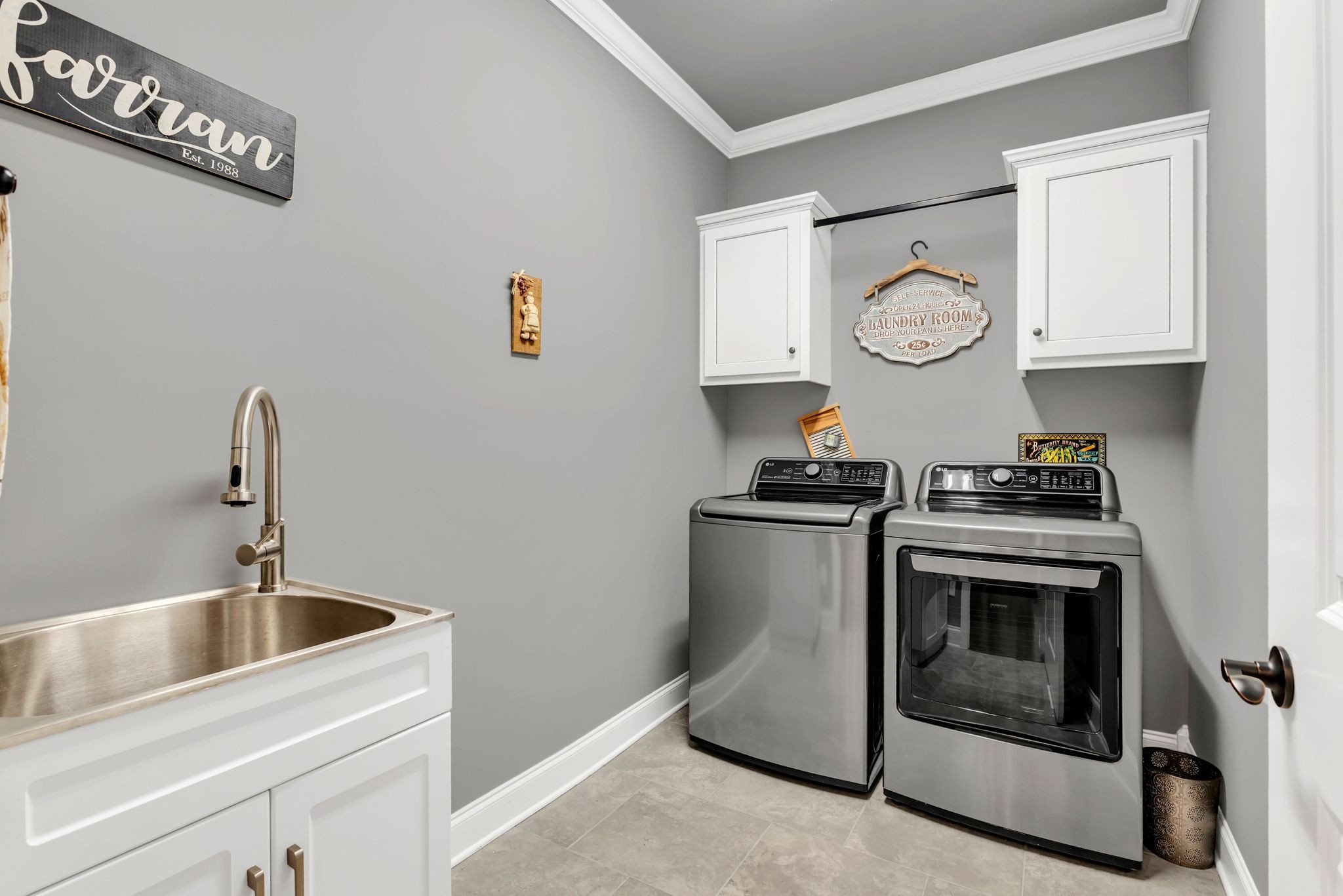 1007 Abbey Rd Way Spring Hill, TN 37174 - Photo 30 of 54 a kitchen with stainless steel appliances granite countertop a sink and a stove