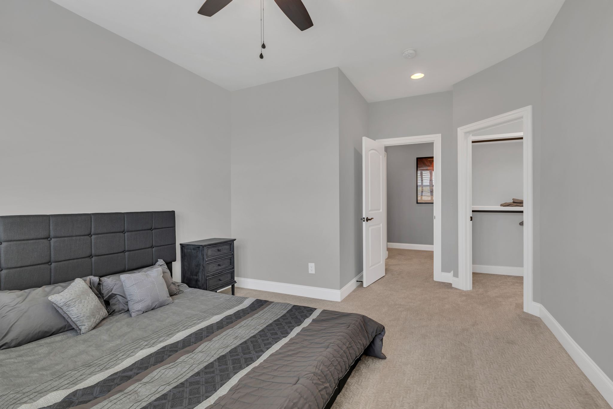 1007 Abbey Rd Way Spring Hill, TN 37174 - Photo 37 of 54 a spacious bedroom with a bed and a walk in closet