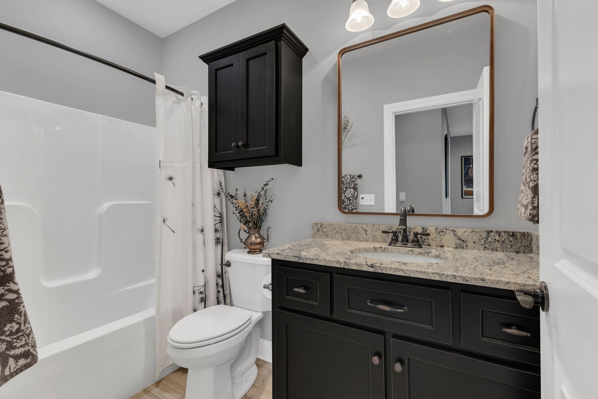 1007 Abbey Rd Way Spring Hill, TN 37174 - Photo 38 of 54 a bathroom with a granite countertop sink toilet and mirror