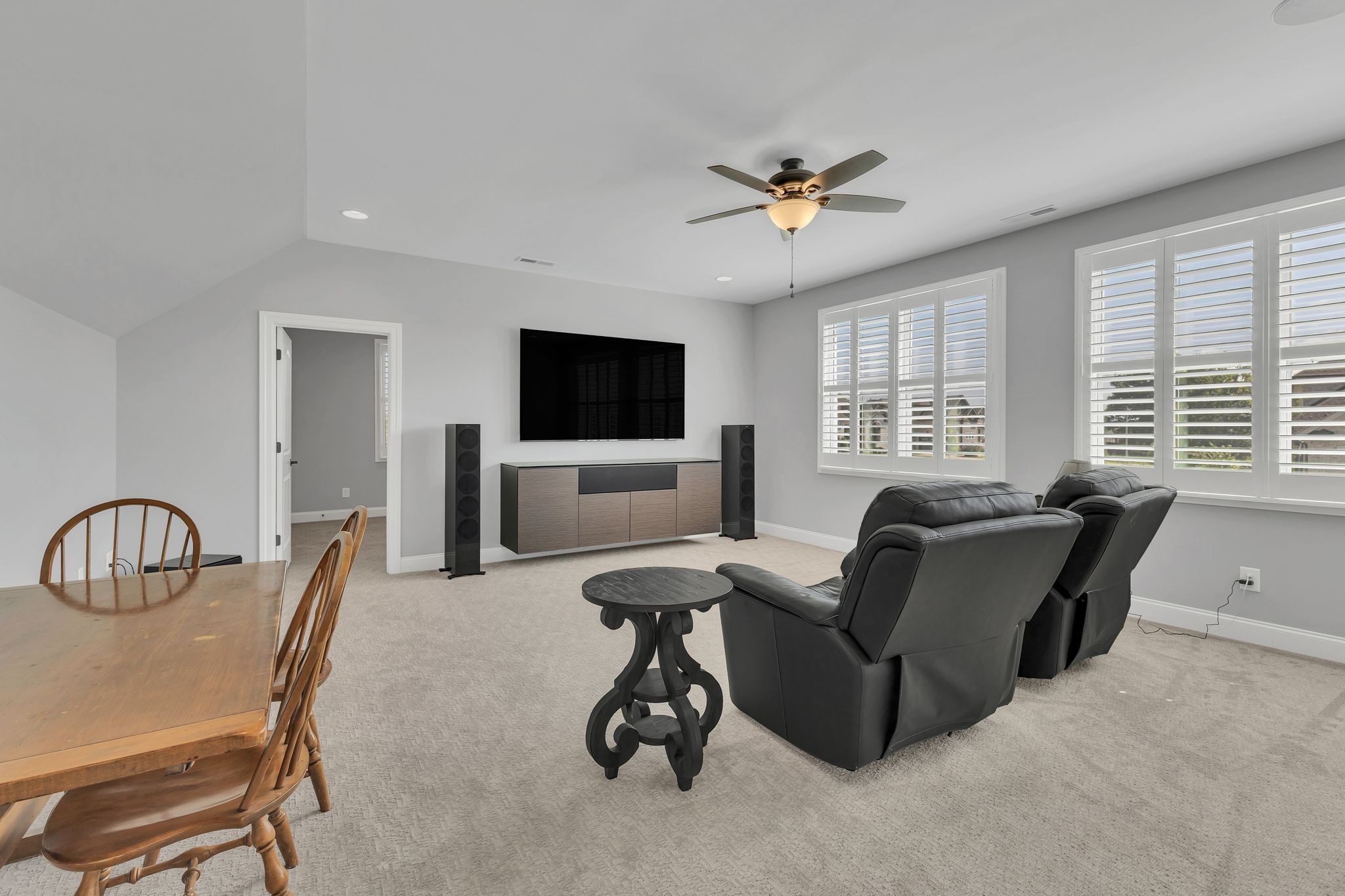 1007 Abbey Rd Way Spring Hill, TN 37174 - Photo 39 of 54 a living room with furniture and a flat screen tv