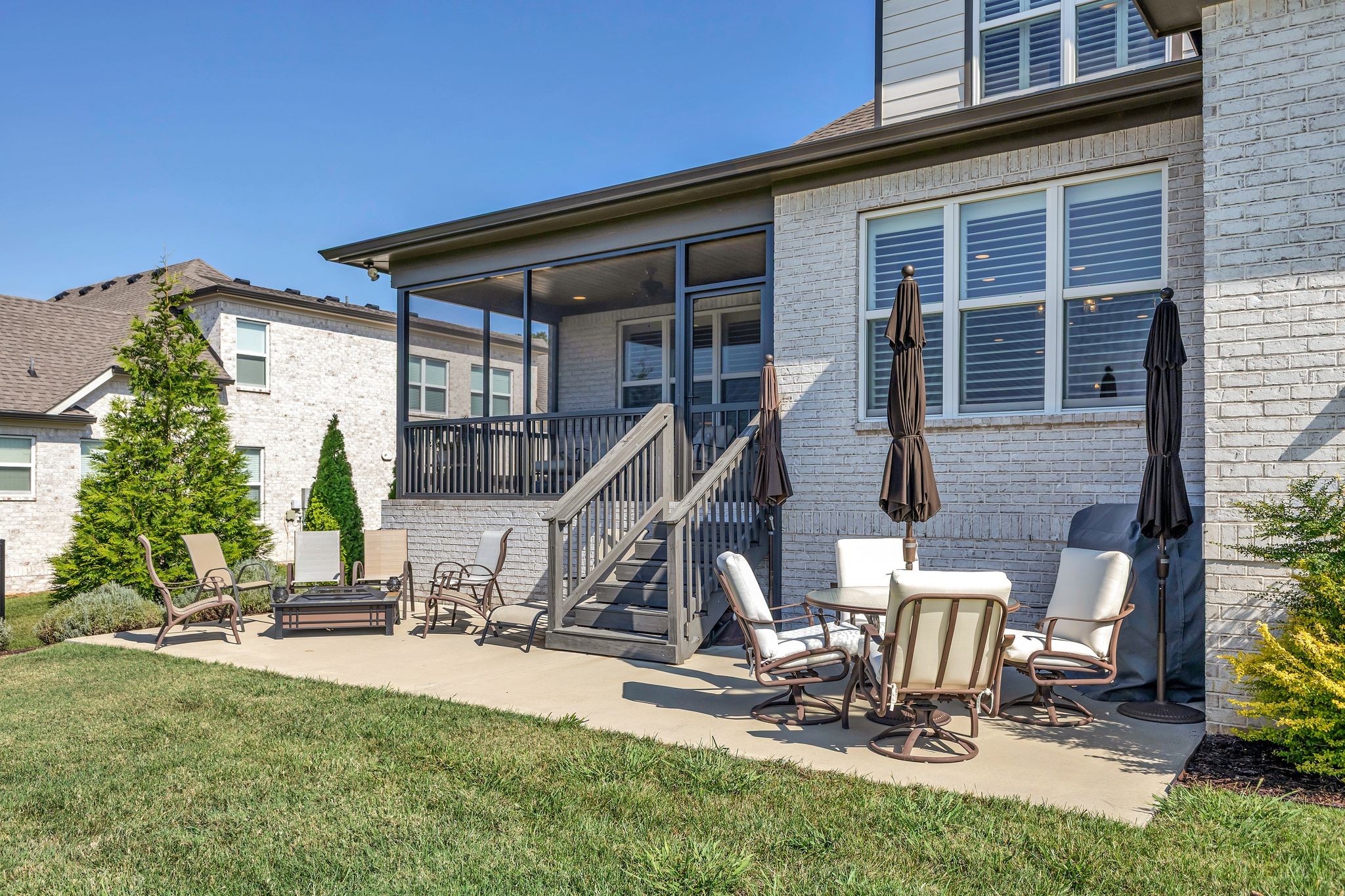 1007 Abbey Rd Way Spring Hill, TN 37174 - Photo 48 of 54 a view of a backyard with a patio
