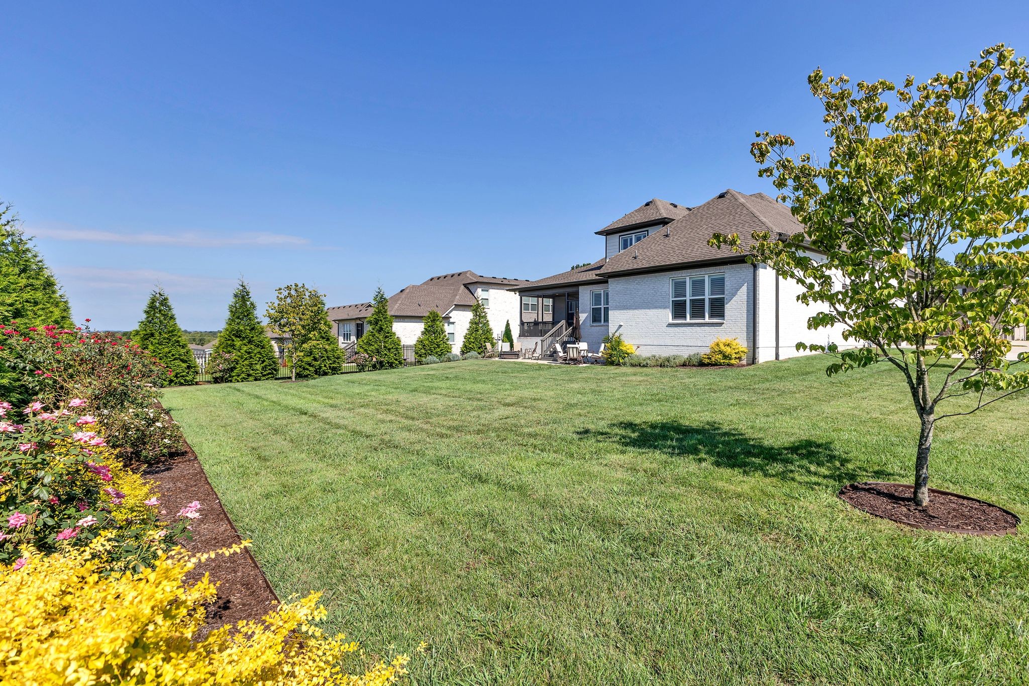 1007 Abbey Rd Way Spring Hill, TN 37174 - Photo 51 of 54 a front view of a house with a yard
