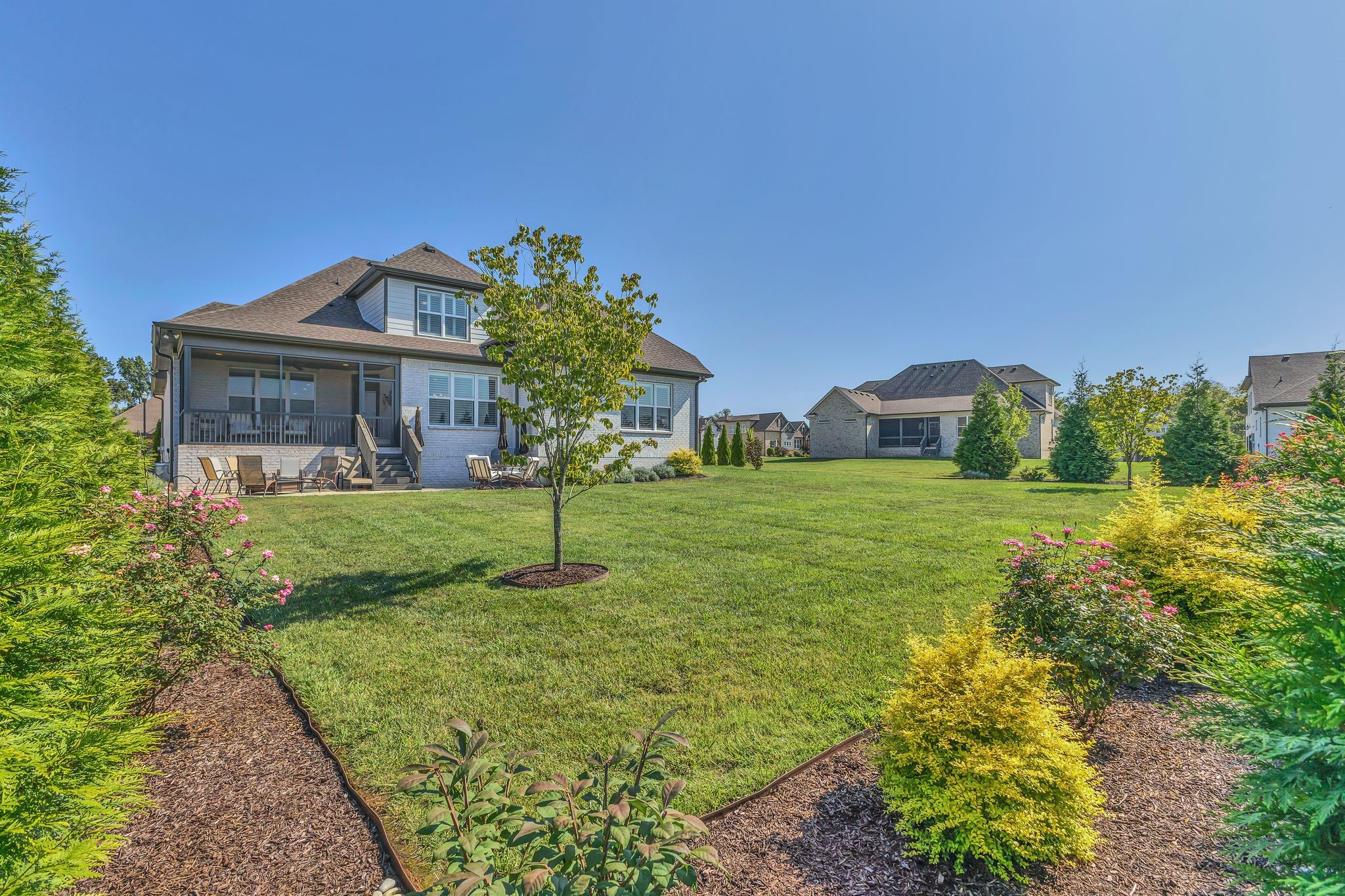 1007 Abbey Rd Way Spring Hill, TN 37174 - Photo 52 of 54 a front view of a house with garden