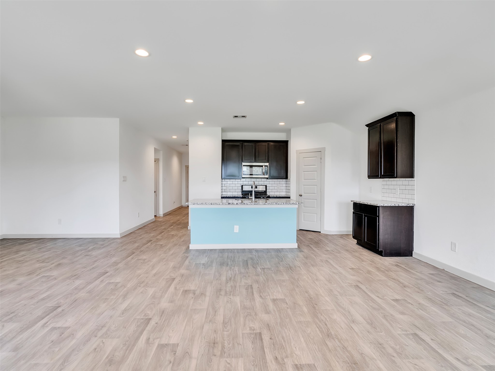 8003 Alcott Forest Lane Rosharon, TX 77583 - Photo 21 of 41 a view of kitchen with microwave oven and cabinets