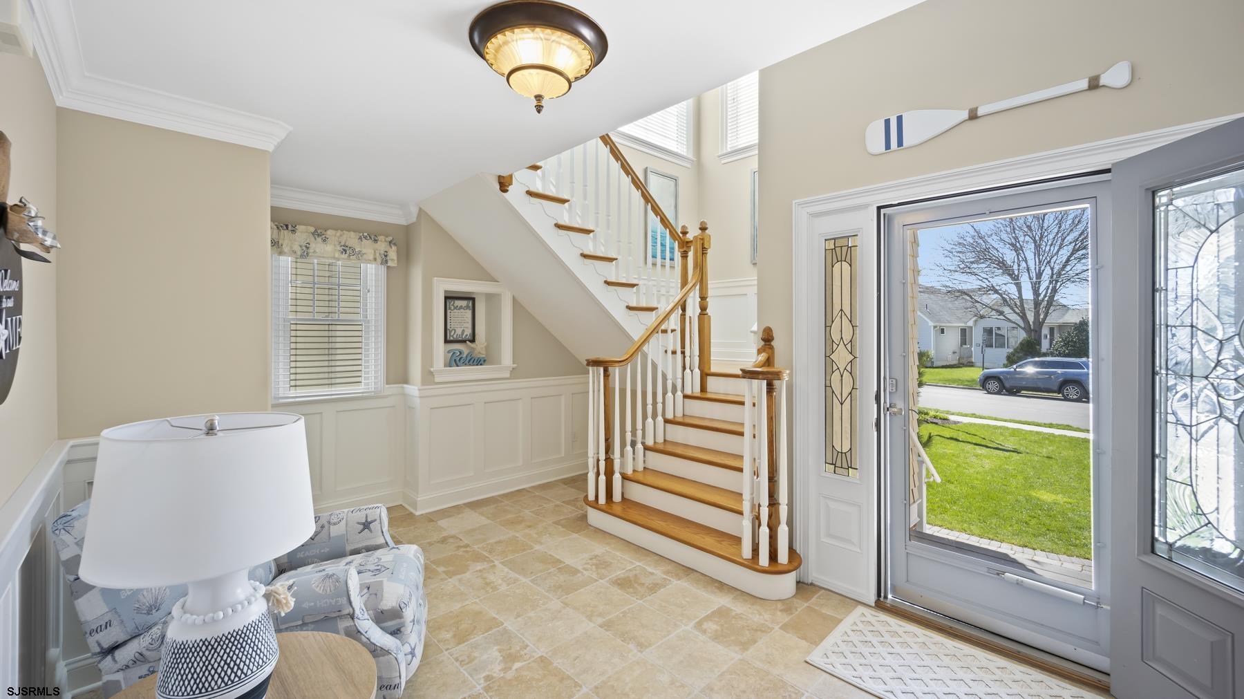 23 Walnut Road Ocean City, NJ 08226 - Photo 14 of 47 a view of a livingroom with furniture and staircase