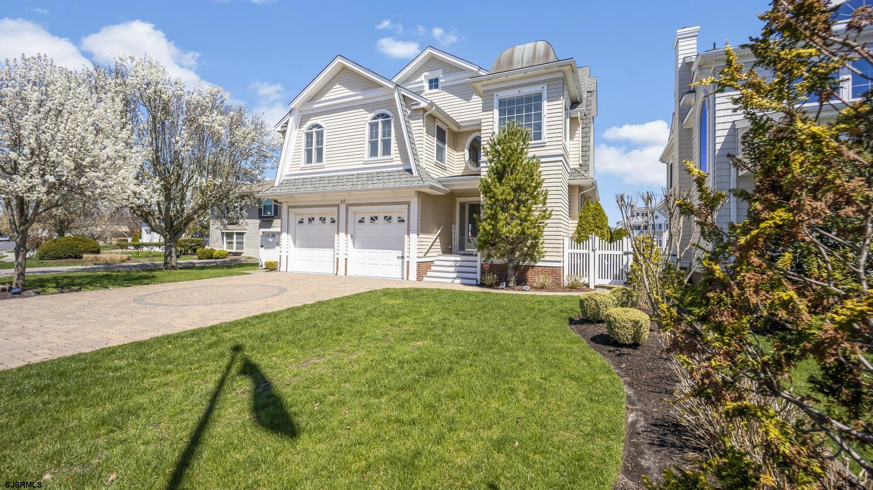 23 Walnut Road Ocean City, NJ 08226 - Photo 2 of 47 a view of a big building with a big yard and large trees