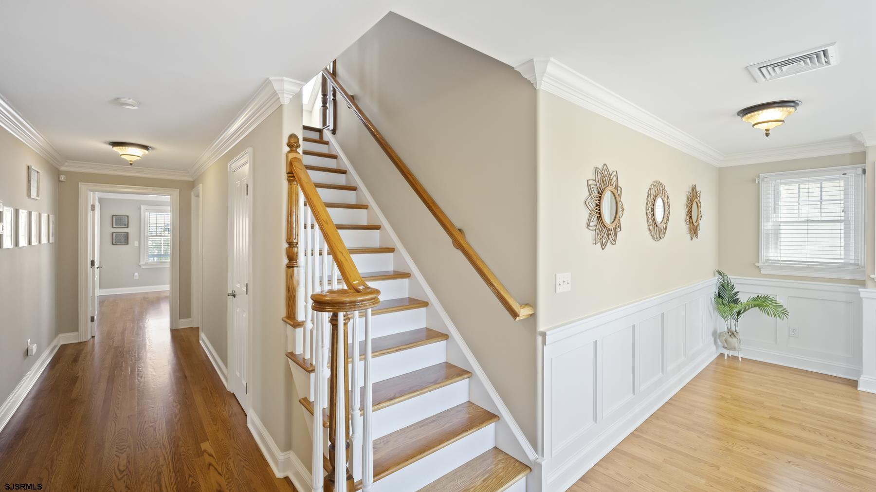 23 Walnut Road Ocean City, NJ 08226 - Photo 24 of 47 a view of a hallway with wooden floor and staircase