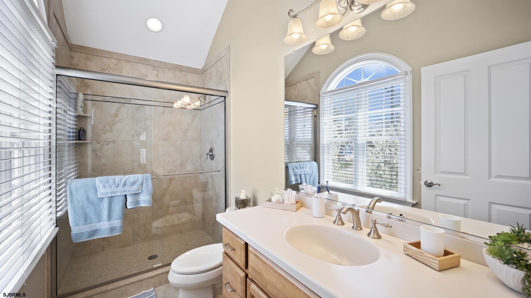 23 Walnut Road Ocean City, NJ 08226 - Photo 26 of 47 a bathroom with a sink toilet and shower