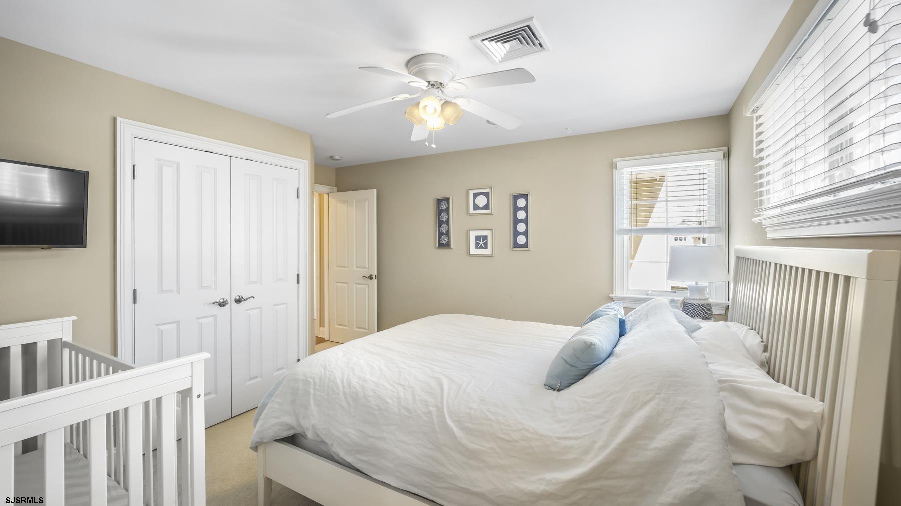 23 Walnut Road Ocean City, NJ 08226 - Photo 33 of 47 a large white bed in a white room