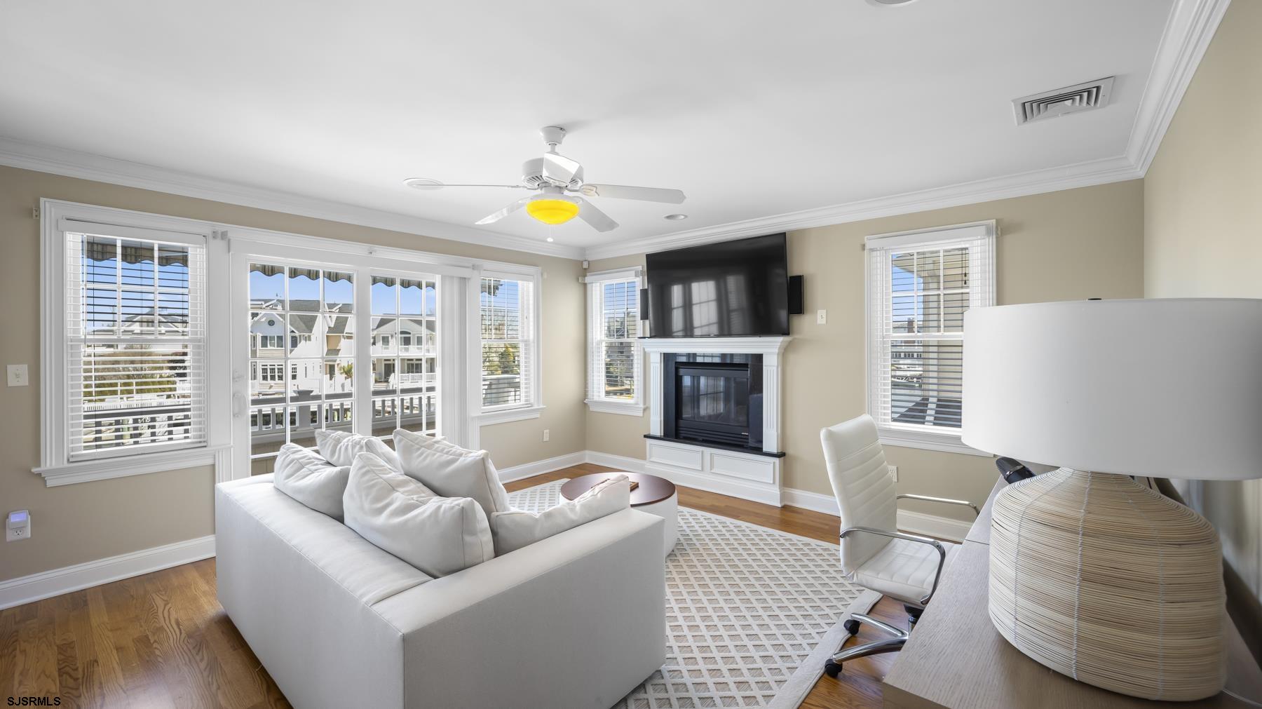 23 Walnut Road Ocean City, NJ 08226 - Photo 34 of 47 a living room with furniture and a fireplace
