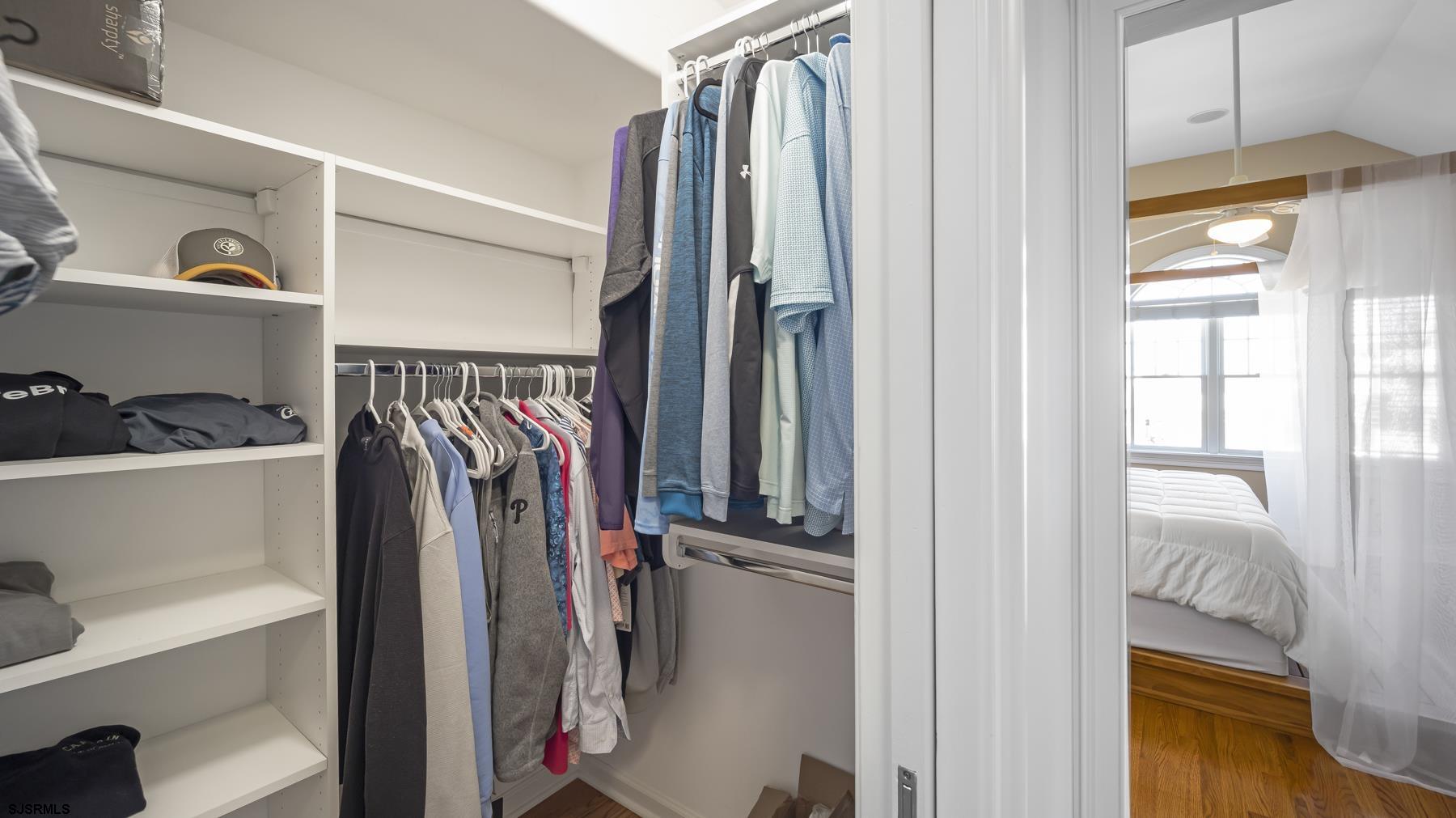 23 Walnut Road Ocean City, NJ 08226 - Photo 38 of 47 a view of walk in closet with clothes and shoes