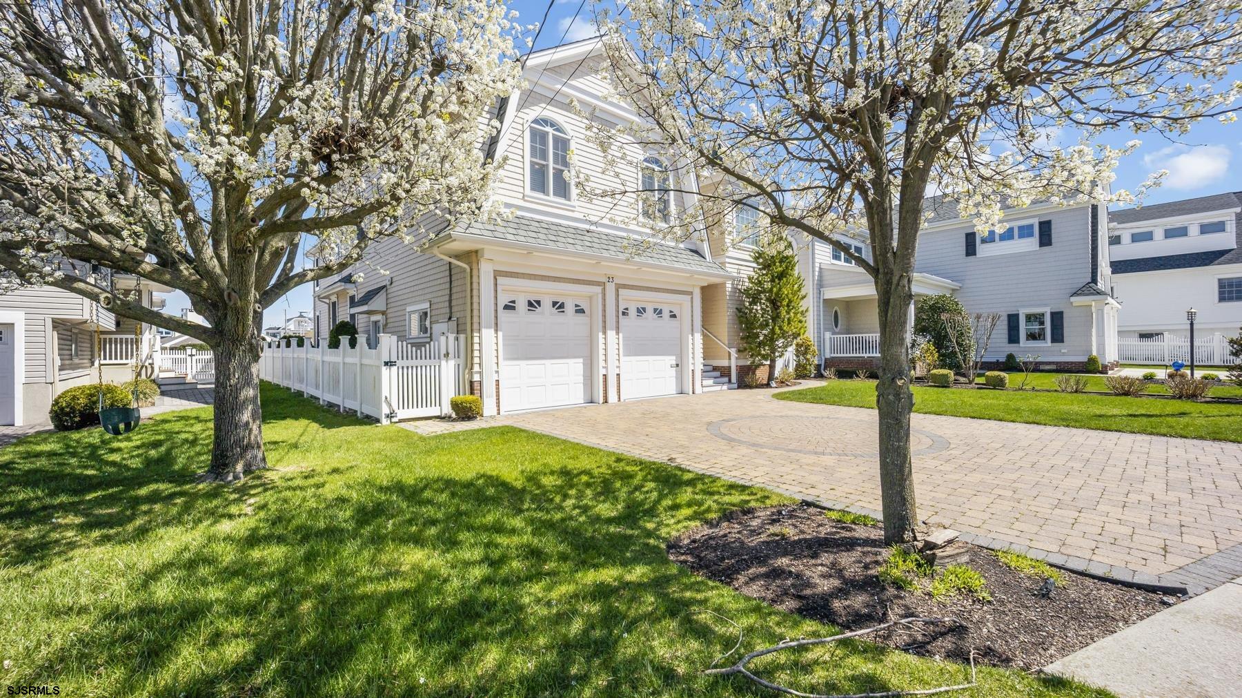 23 Walnut Road Ocean City, NJ 08226 - Photo 4 of 47 a house with trees in front of it