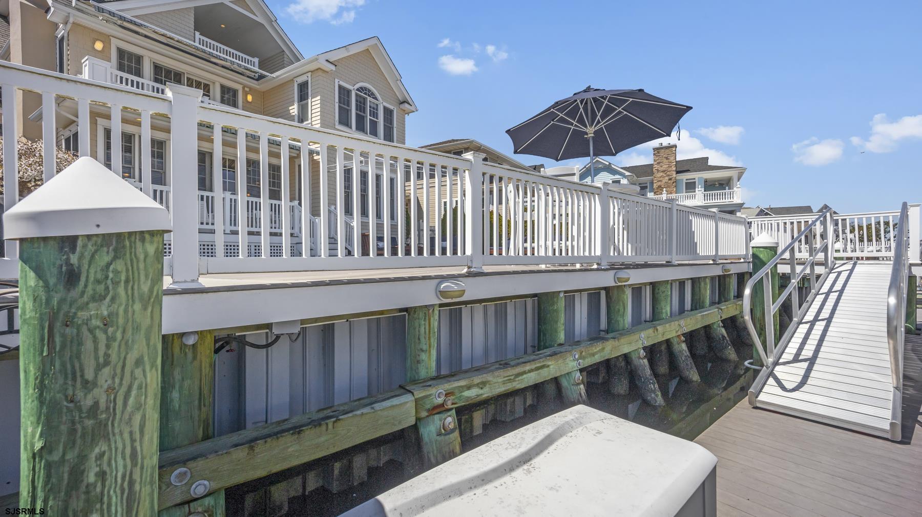 23 Walnut Road Ocean City, NJ 08226 - Photo 47 of 47 a view of a house with a deck