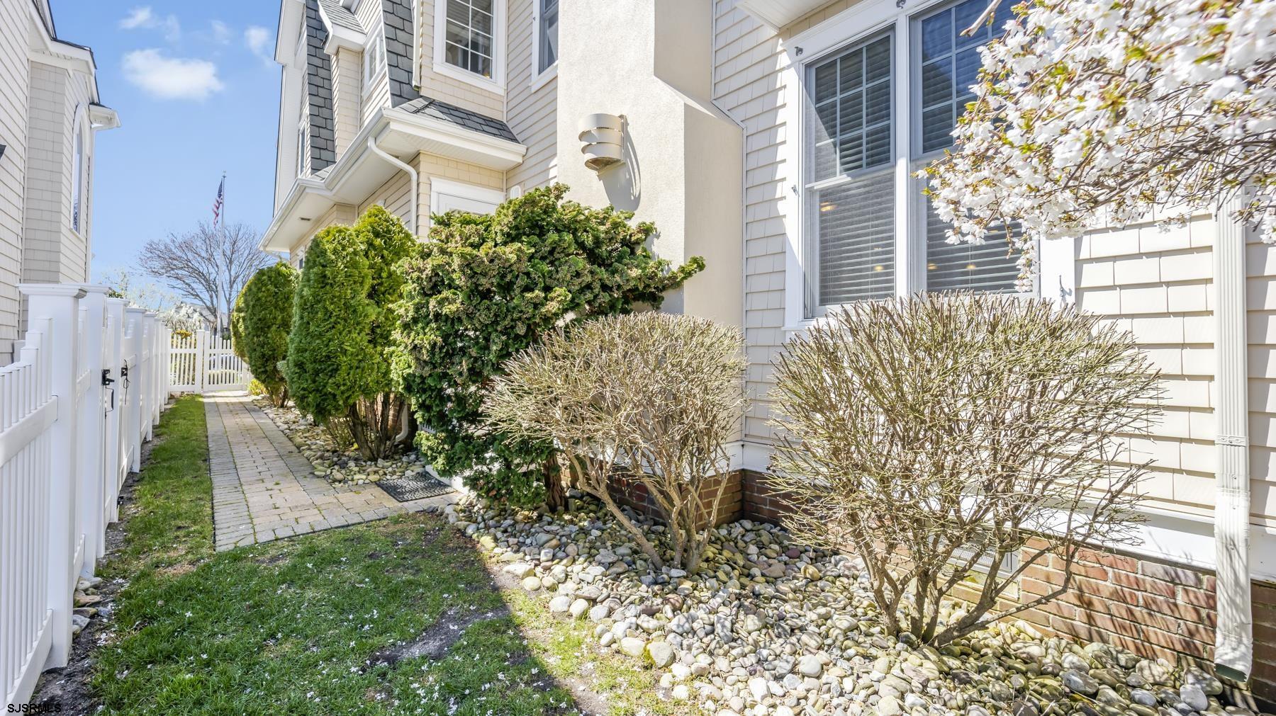 23 Walnut Road Ocean City, NJ 08226 - Photo 5 of 47 a view of a backyard with plants