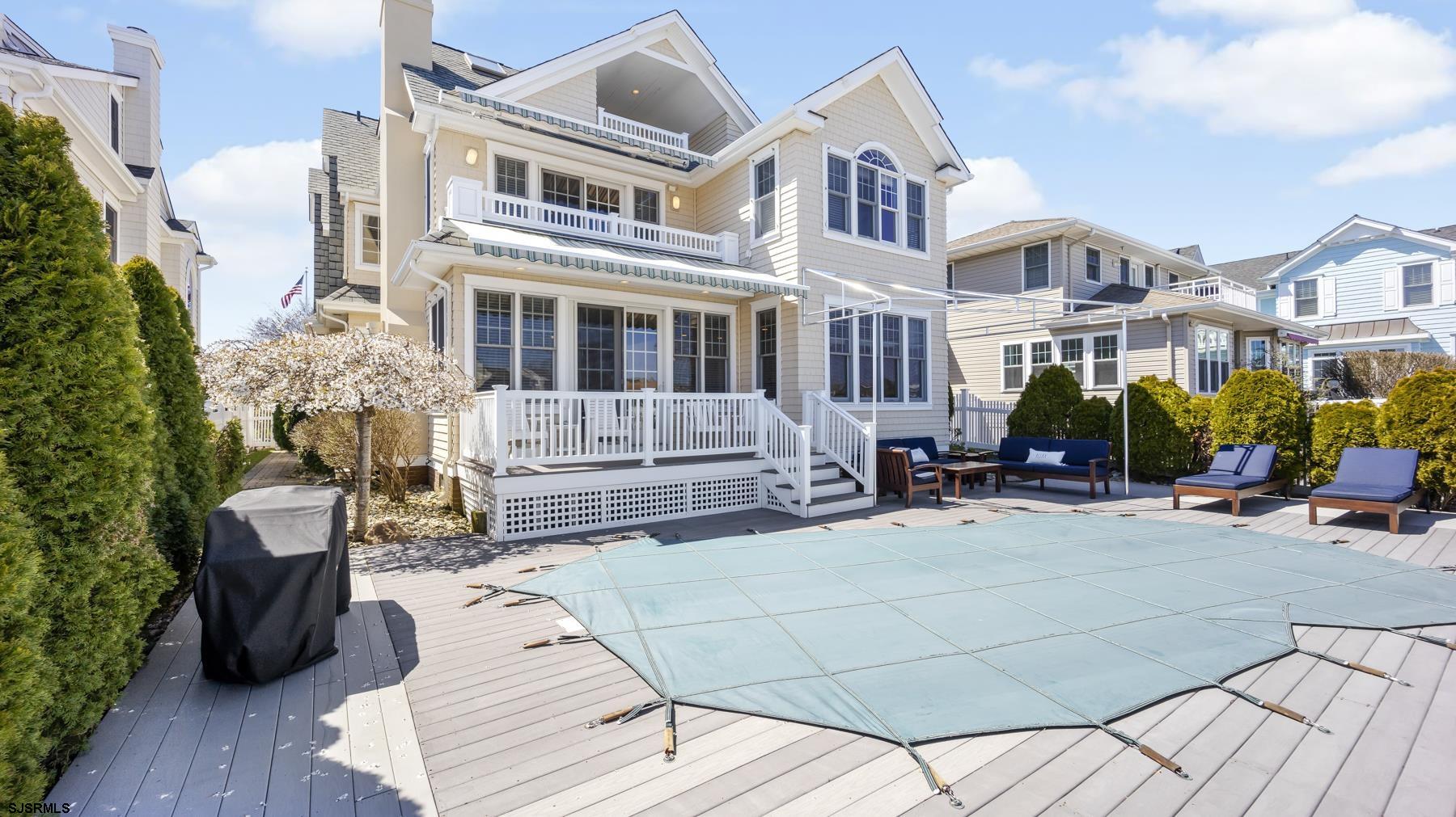 23 Walnut Road Ocean City, NJ 08226 - Photo 6 of 47 a view of a building with sitting area