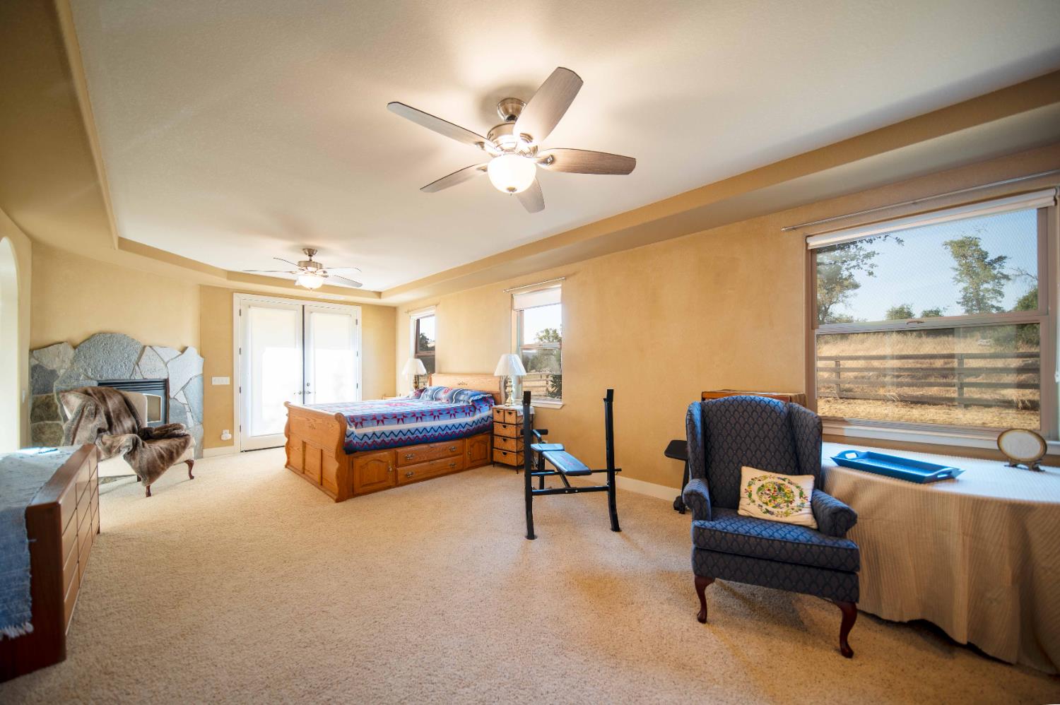 26027 Auberry Road Clovis, CA 93619 - Photo 22 of 46 a living room with furniture and a chandelier