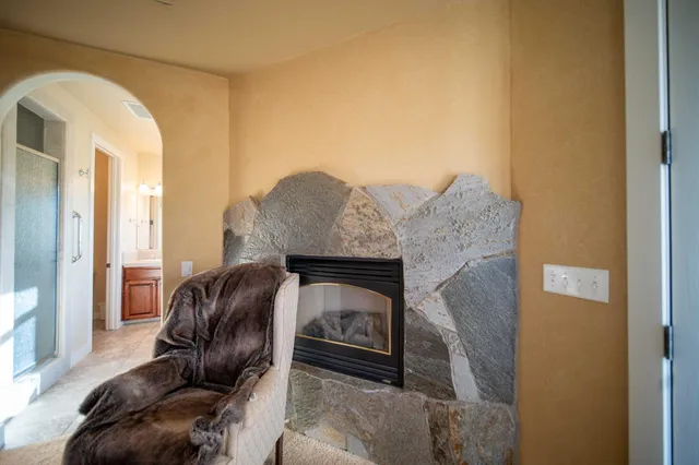 a bathroom with a toilet sink and shower