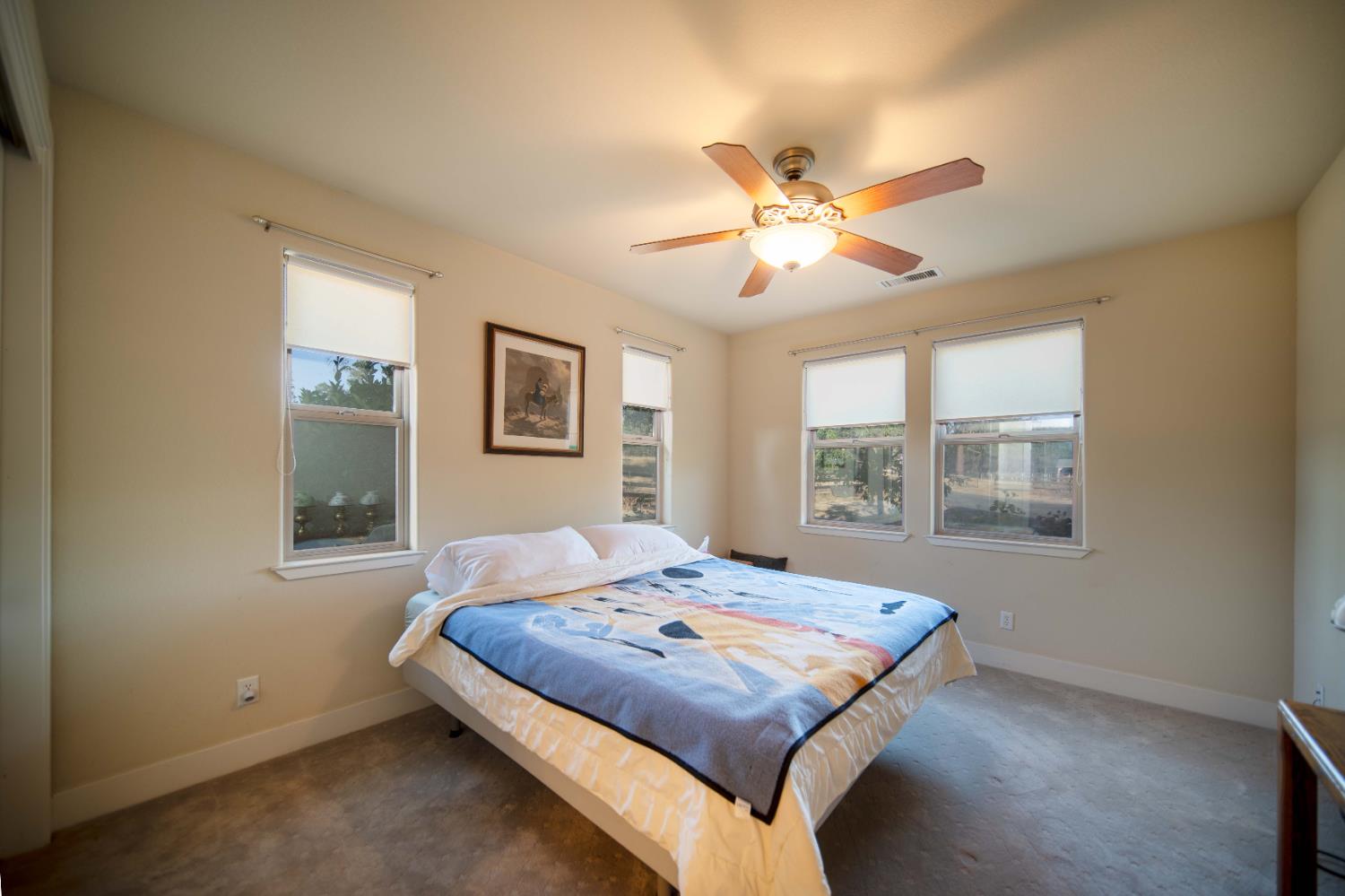 26027 Auberry Road Clovis, CA 93619 - Photo 29 of 46 a bedroom with a large bed and a window