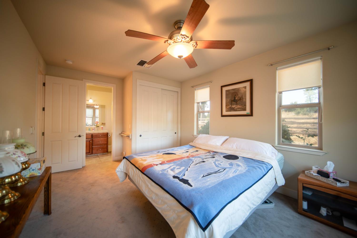 26027 Auberry Road Clovis, CA 93619 - Photo 30 of 46 a living room with furniture and a chandelier