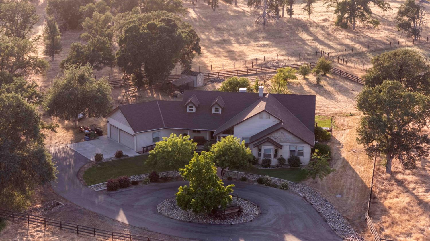 26027 Auberry Road Clovis, CA 93619 - Photo 36 of 46 a view of a house with a yard