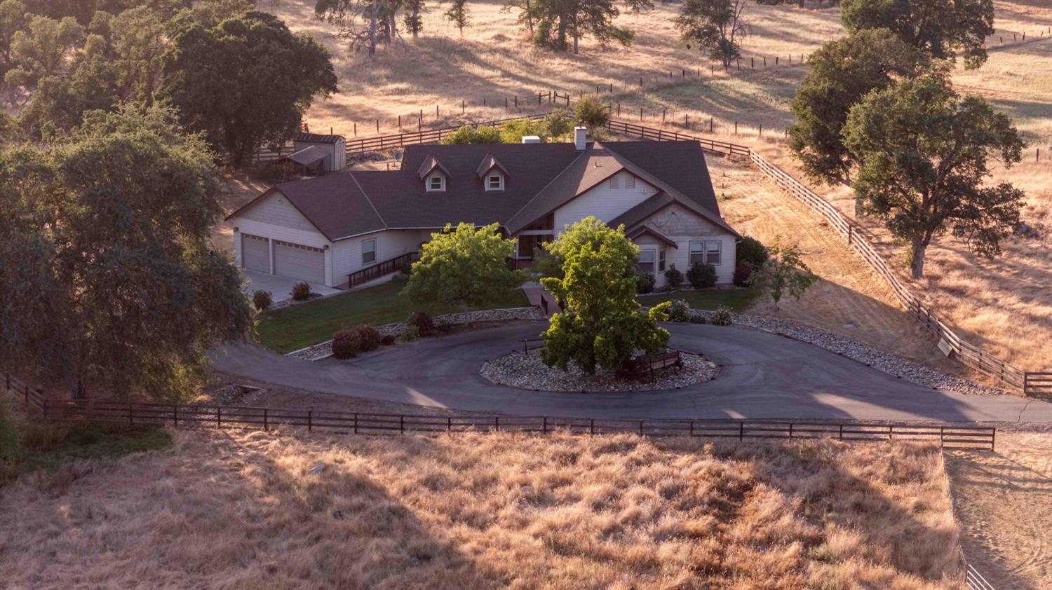 26027 Auberry Road Clovis, CA 93619 - Photo 37 of 46 a view of a house with a yard