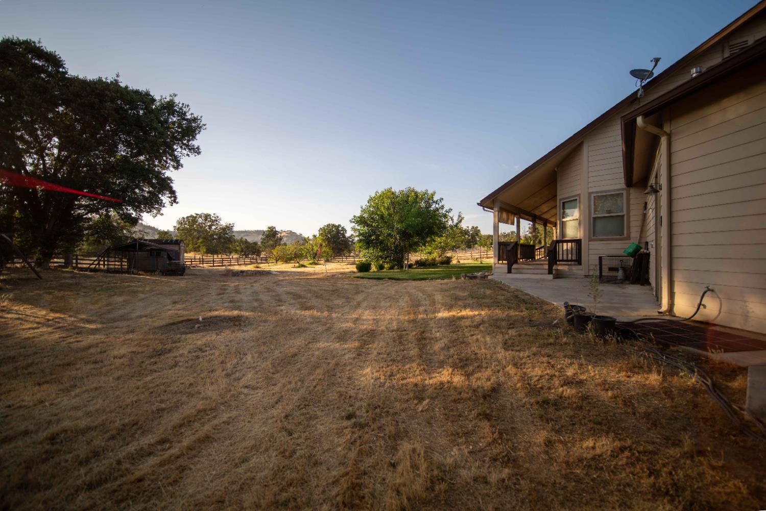 26027 Auberry Road Clovis, CA 93619 - Photo 10 of 46 a view of outdoor space with deck and yard